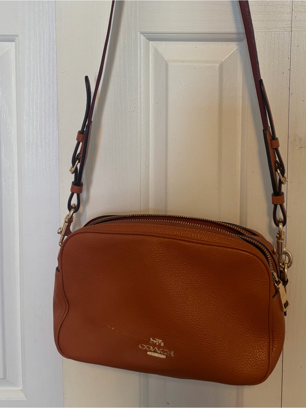Coach Burnt Orange Pebbled Leather Crossbody with Dark Strap
